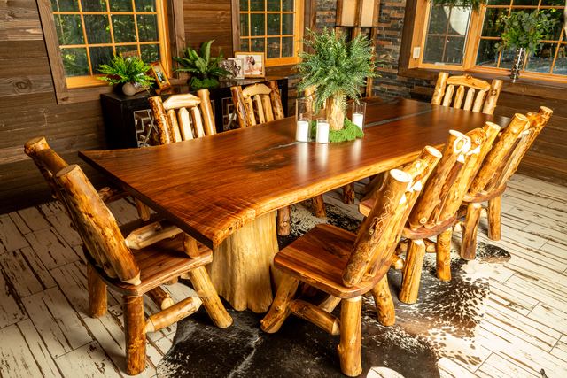 Walnut dining table with cedar stump base and aspen chairs